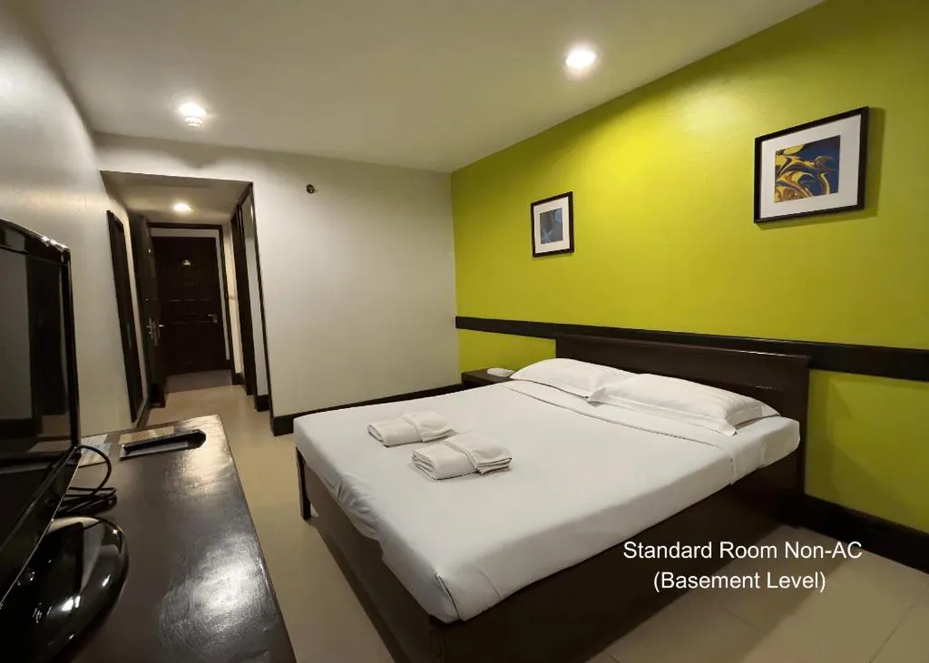 Bed in Citylight Hotel