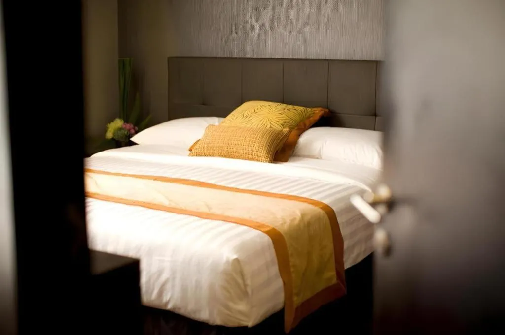 Bed in F1 Hotel Manila