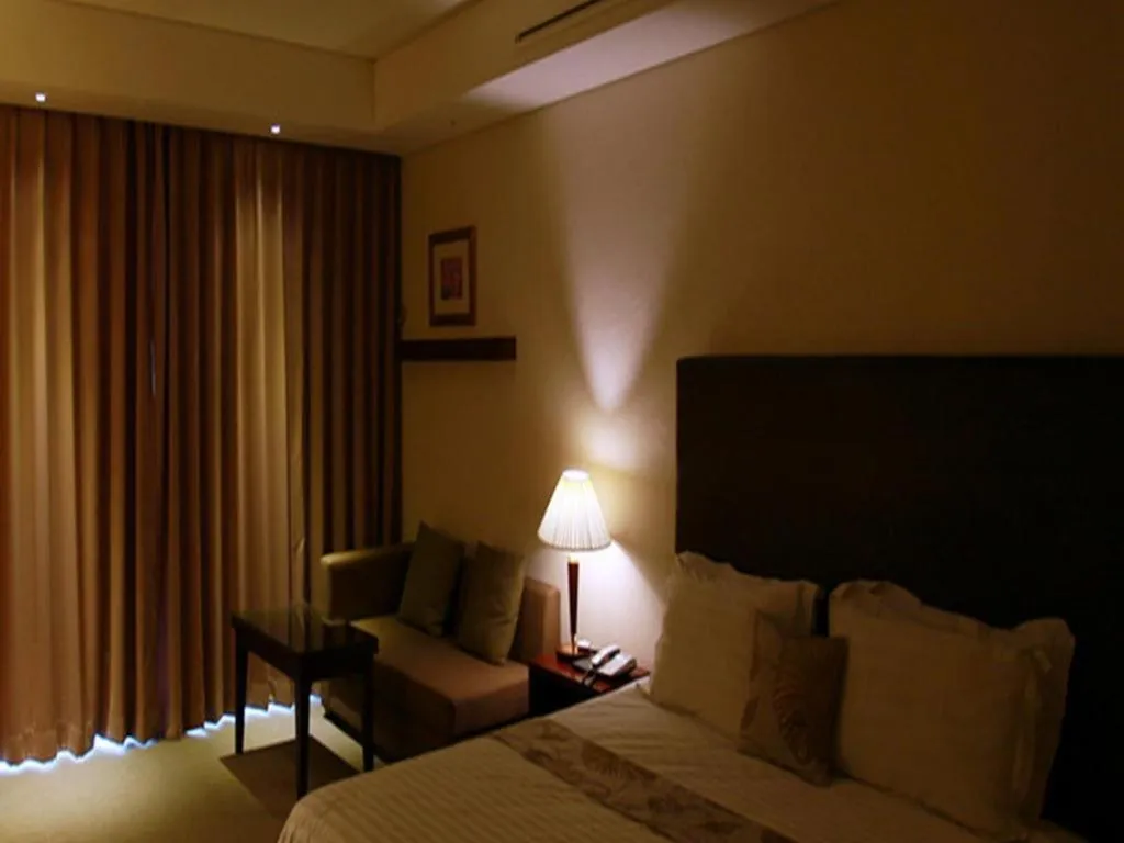 Bed in Hotel Sunshine