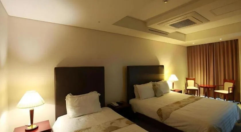 Bed in Hotel Sunshine