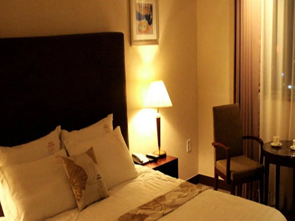 Bed in Hotel Sunshine