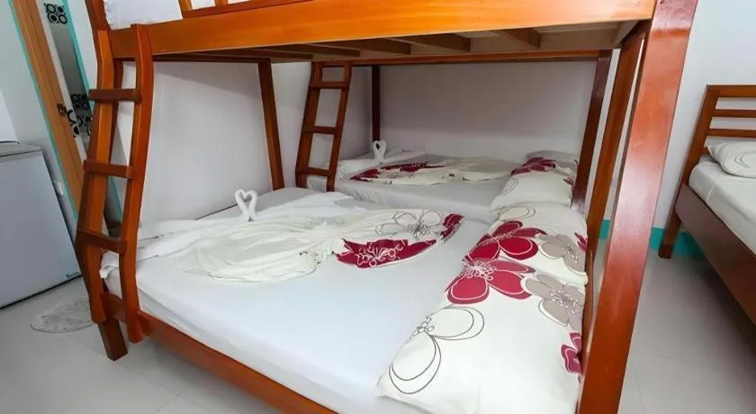 Bed in Palm Grove Saud Holiday Complex Hotel