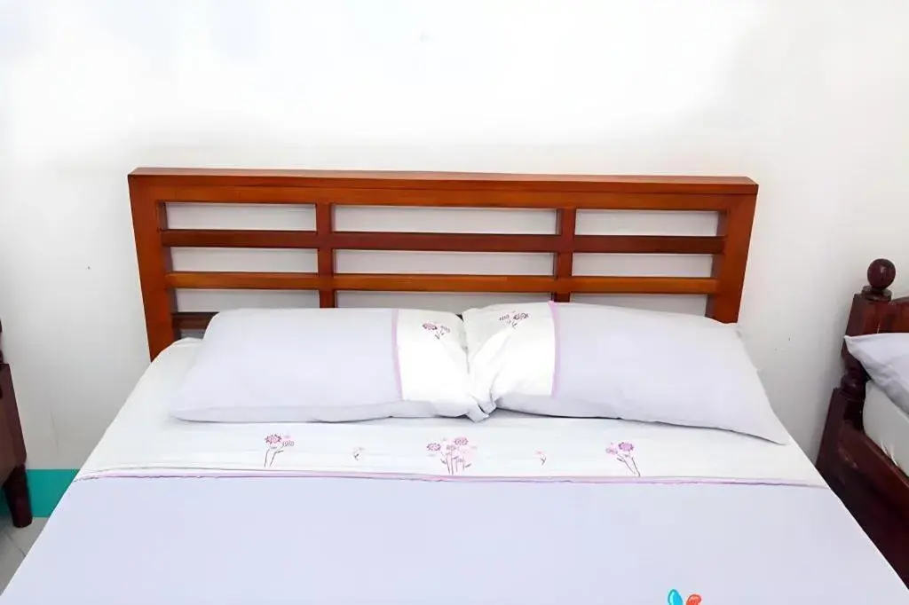 Bed in Palm Grove Saud Holiday Complex Hotel Bed in Palm Grove Saud Holiday Complex Hotel