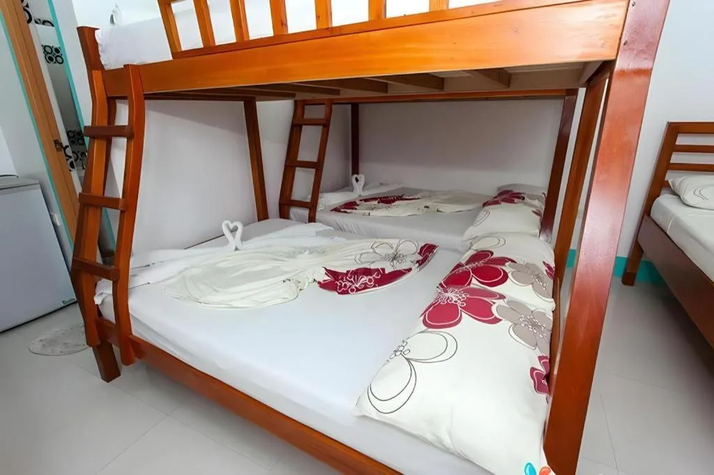 Bed in Palm Grove Saud Holiday Complex Hotel