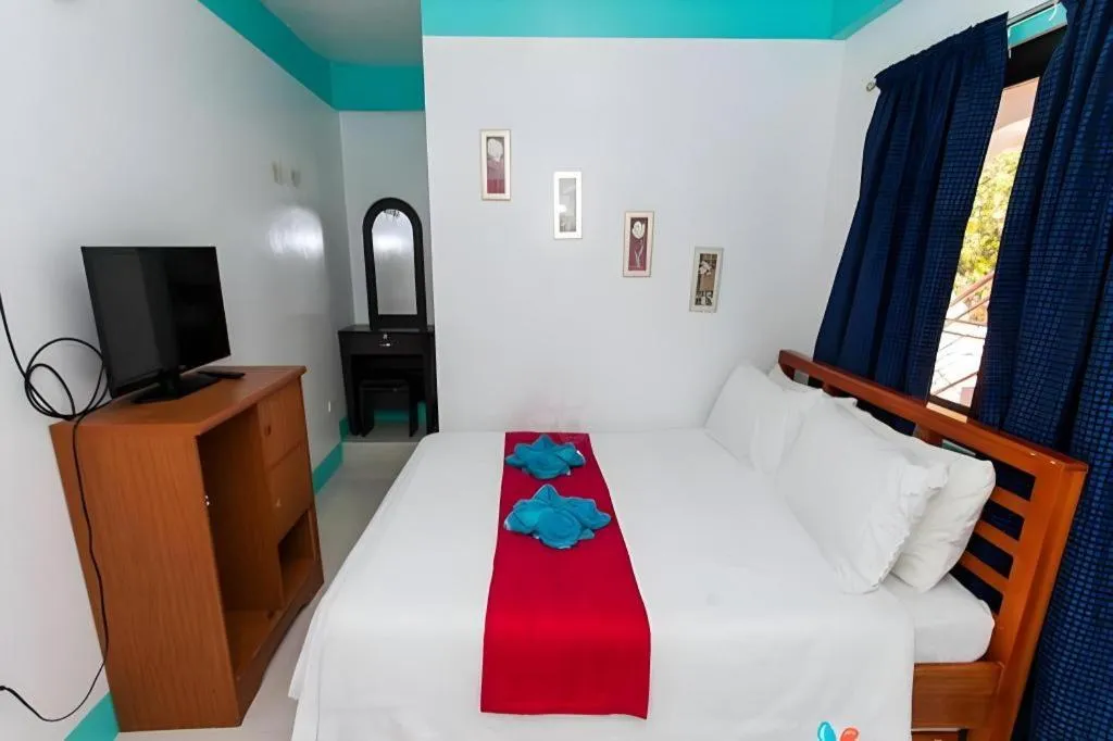 Bed in Palm Grove Saud Holiday Complex Hotel