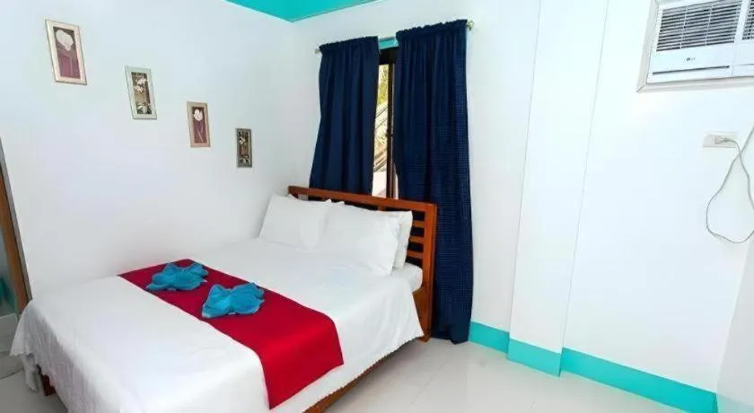 Bed in Palm Grove Saud Holiday Complex Hotel