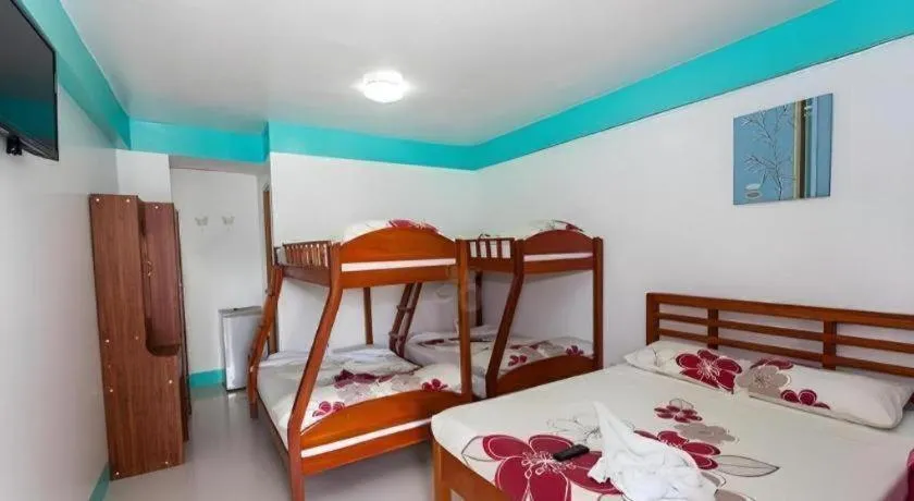 Bed in Palm Grove Saud Holiday Complex Hotel