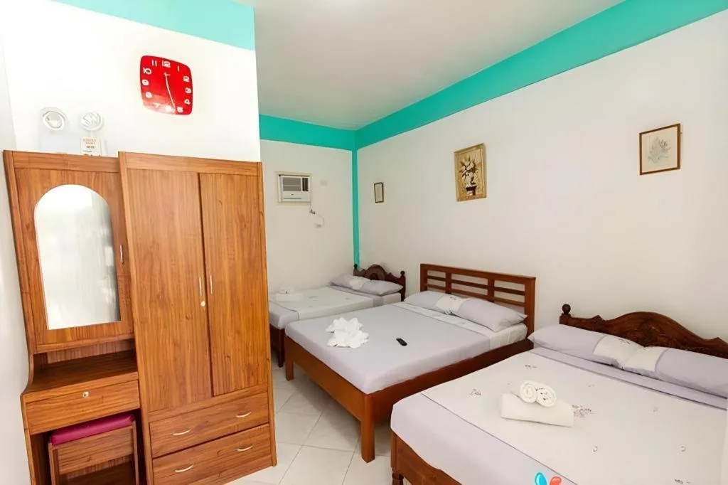 Bed in Palm Grove Saud Holiday Complex Hotel