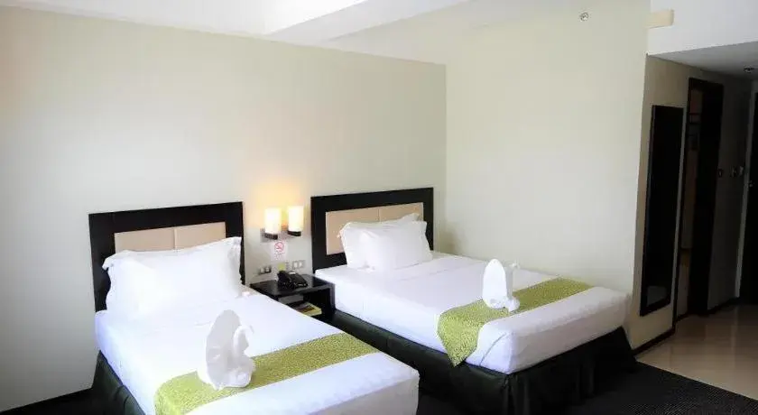 Bed in Mallberry Suites Business Hotel Bed in Mallberry Suites Business Hotel