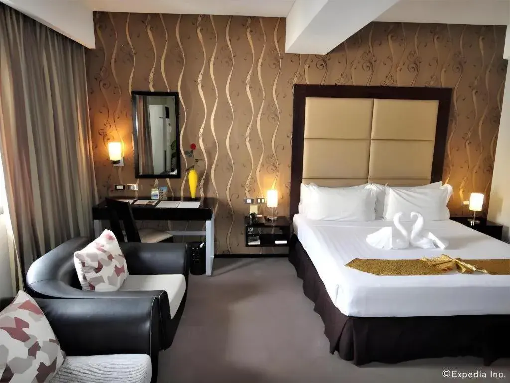 Bed in Mallberry Suites Business Hotel Bed in Mallberry Suites Business Hotel