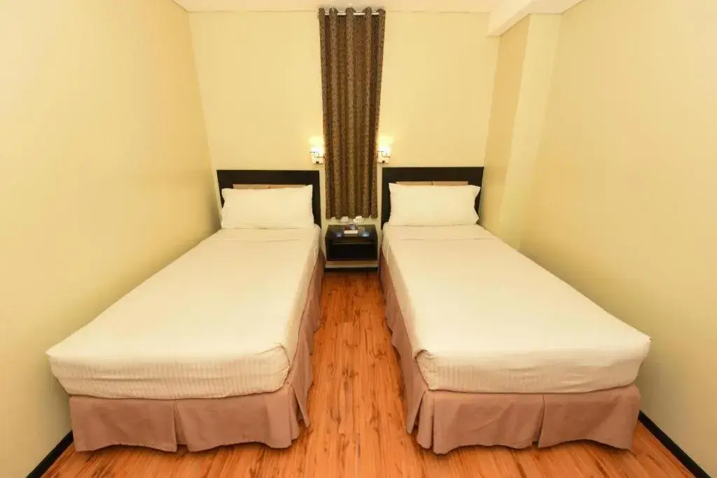 Bed in Mallberry Suites Business Hotel Bed in Mallberry Suites Business Hotel