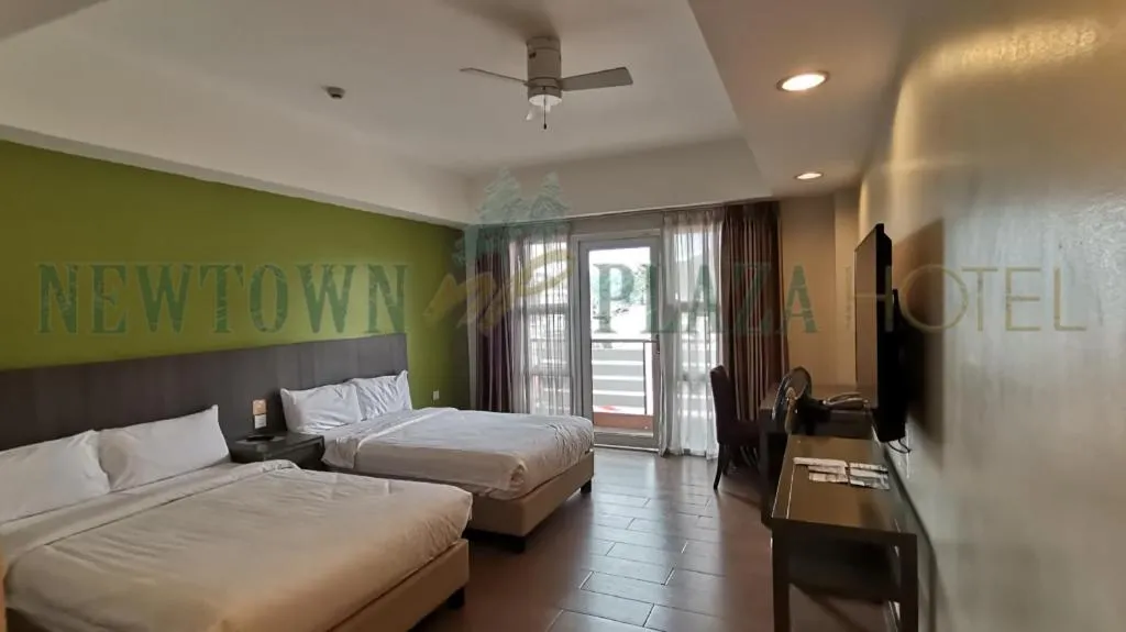 Bed in Newtown Plaza Hotel