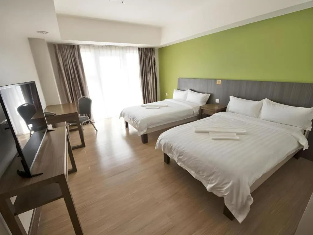 Bed in Newtown Plaza Hotel