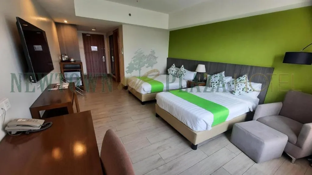 Bed in Newtown Plaza Hotel