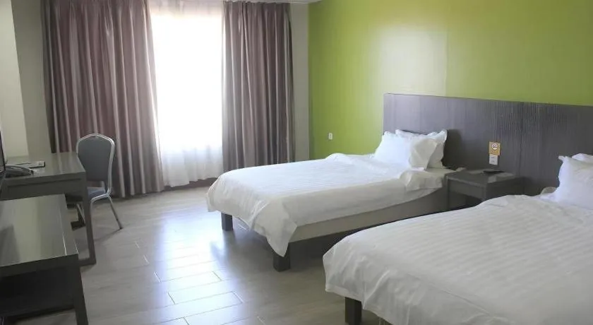 Bed in Newtown Plaza Hotel