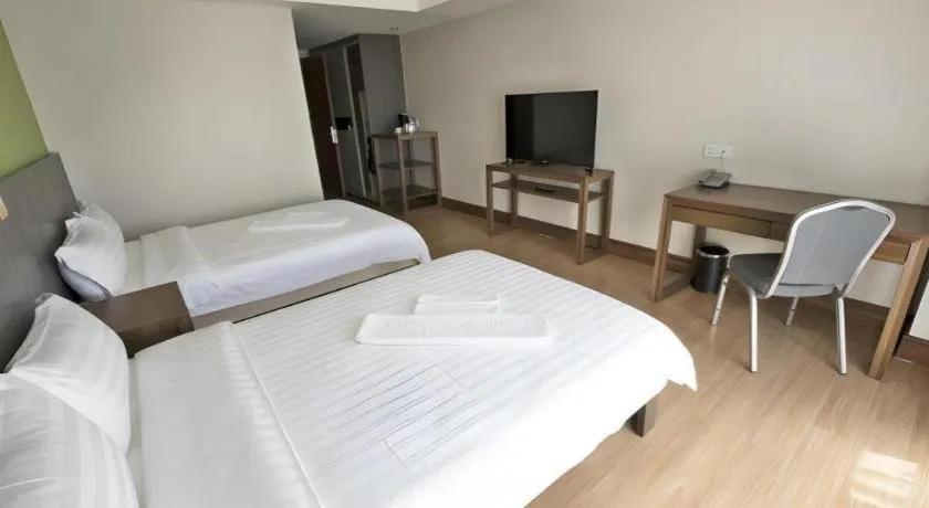 Bed in Newtown Plaza Hotel