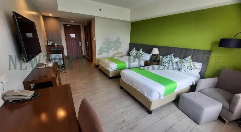 Bed in Newtown Plaza Hotel