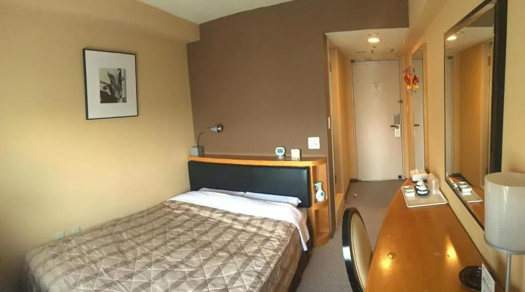 Bed in Diamond Hotel Tokyo