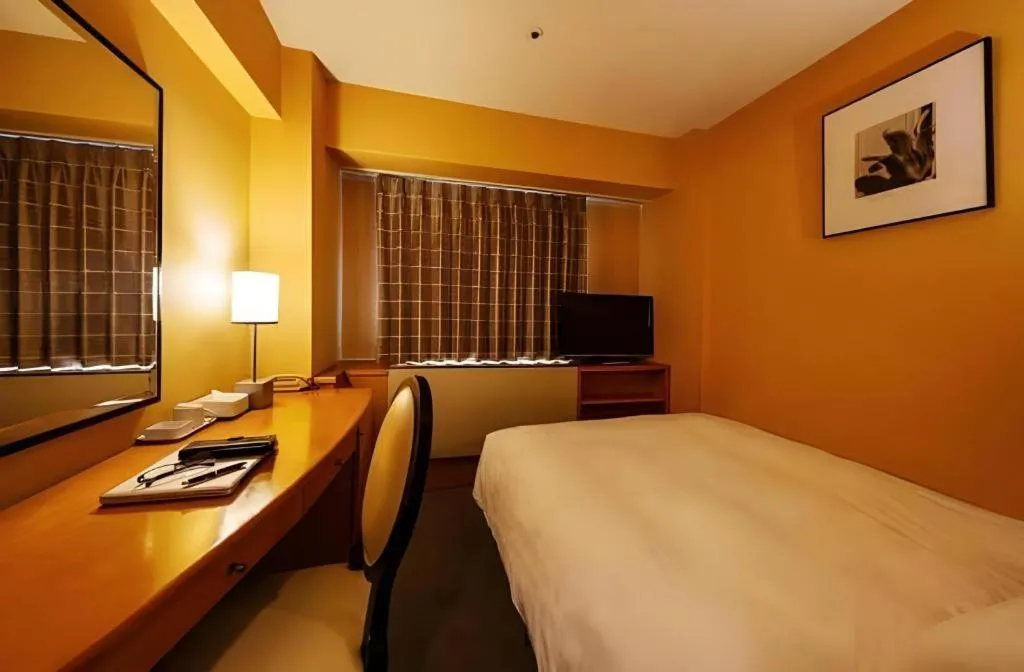 Bed in Diamond Hotel Tokyo