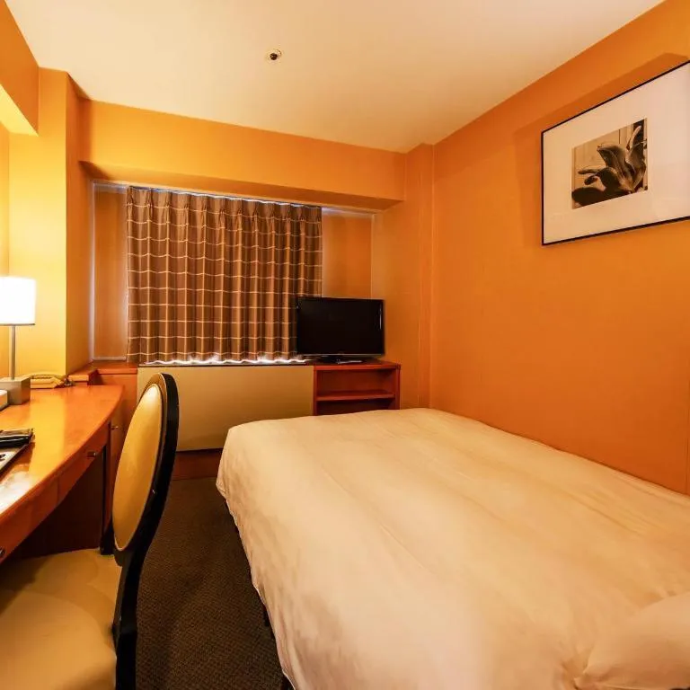 Bed in Diamond Hotel Tokyo