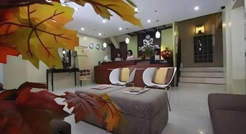 Bed in Sampaguita Suites Plaza Garcia