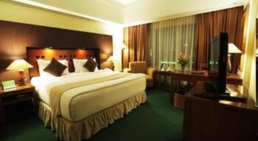 Bed in Oasis Amir Hotel