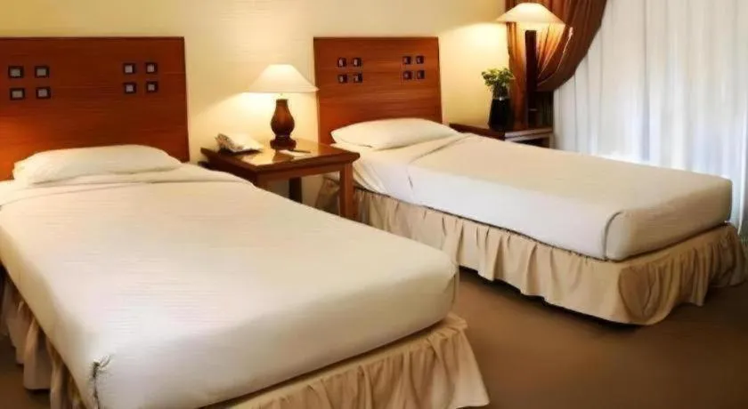 Bed in Oasis Amir Hotel