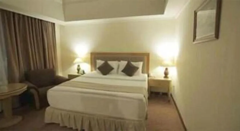 Bed in Oasis Amir Hotel