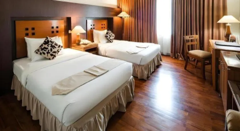 Bed in Oasis Amir Hotel