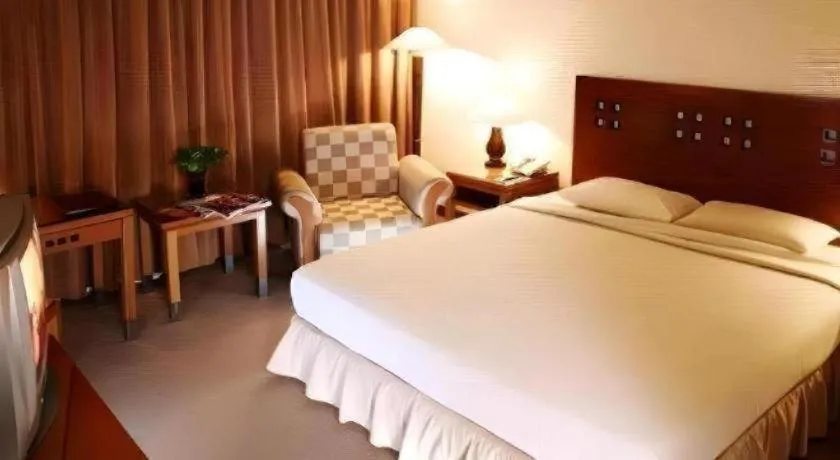 Bed in Oasis Amir Hotel