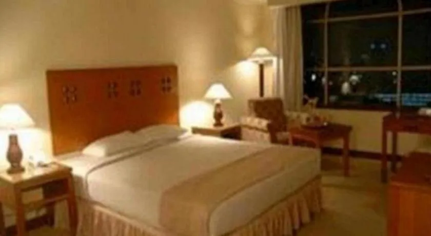 Bed in Oasis Amir Hotel