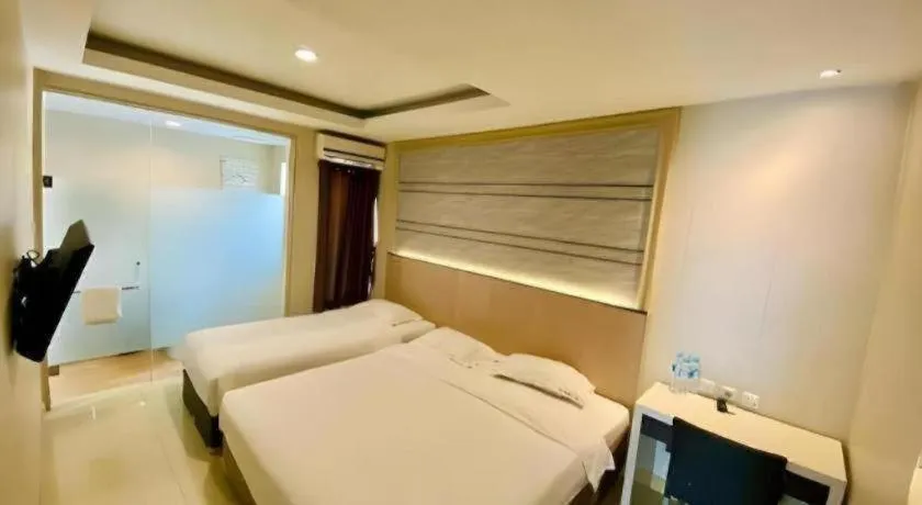 Bed in Sumi Hotel Simpang Lima Semarang