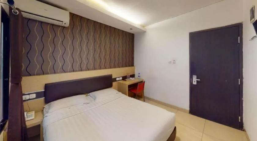Bed in Sumi Hotel Simpang Lima Semarang