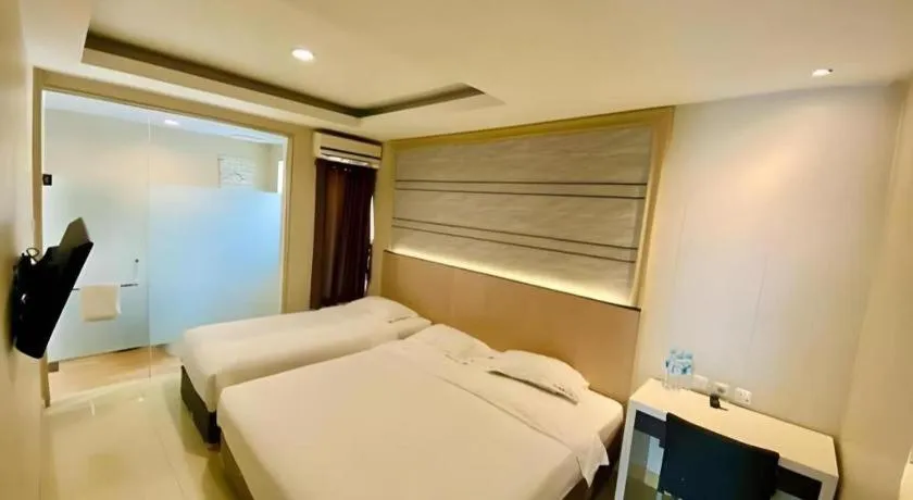 Bed in Sumi Hotel Simpang Lima Semarang