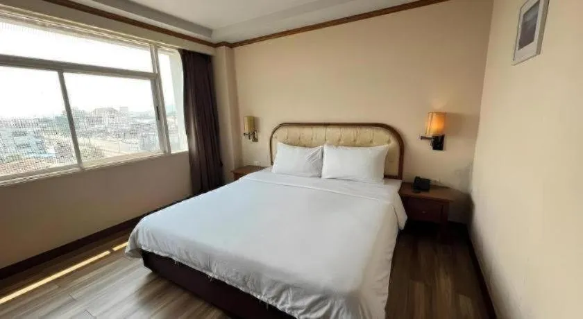 Bed in Western Grand Hotel Ratchaburi