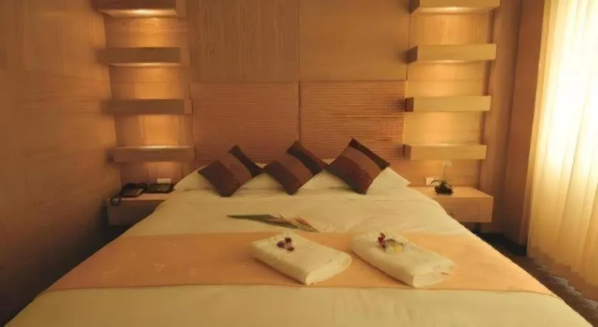 Bed in Western Grand Hotel Ratchaburi