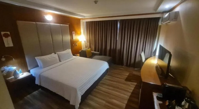 Bed in Western Grand Hotel Ratchaburi