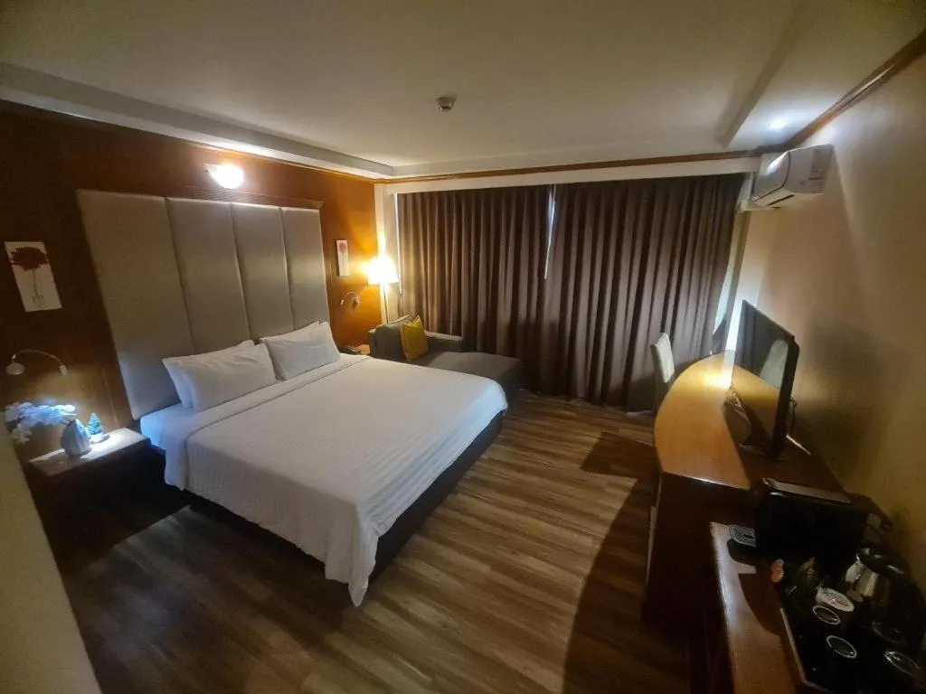 Bed in Western Grand Hotel Ratchaburi