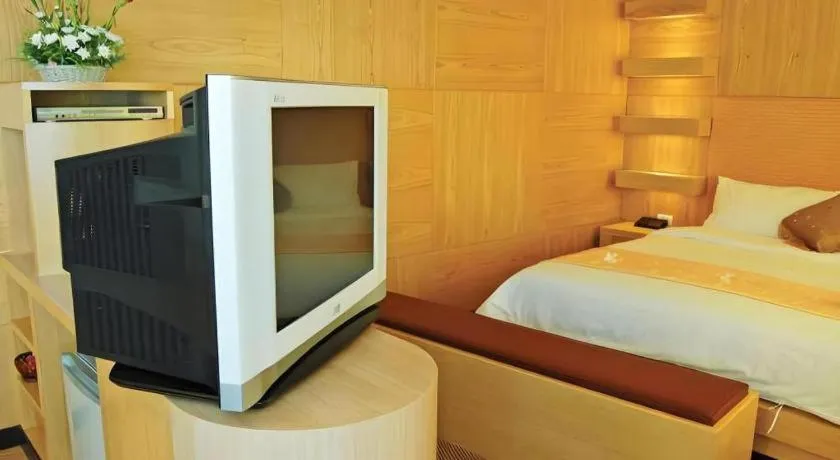 Bed in Western Grand Hotel Ratchaburi