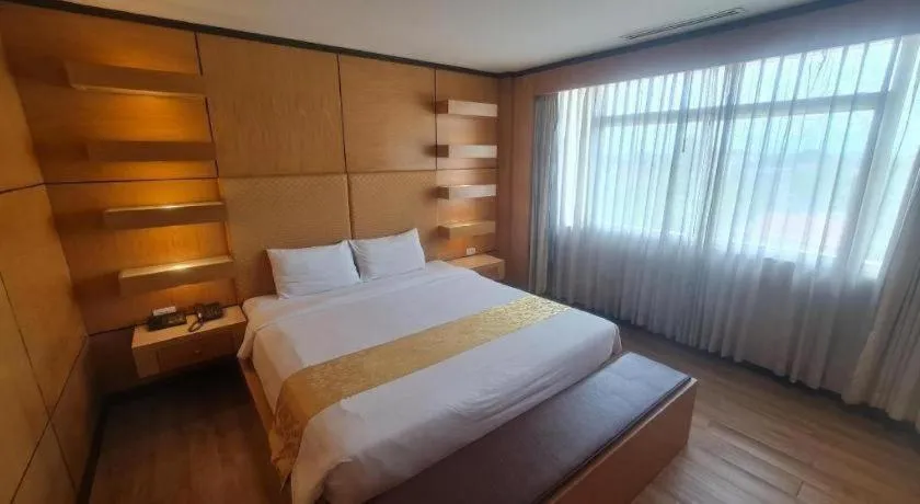 Bed in Western Grand Hotel Ratchaburi