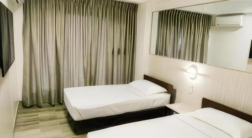 Bed in Travelite Express Hotel