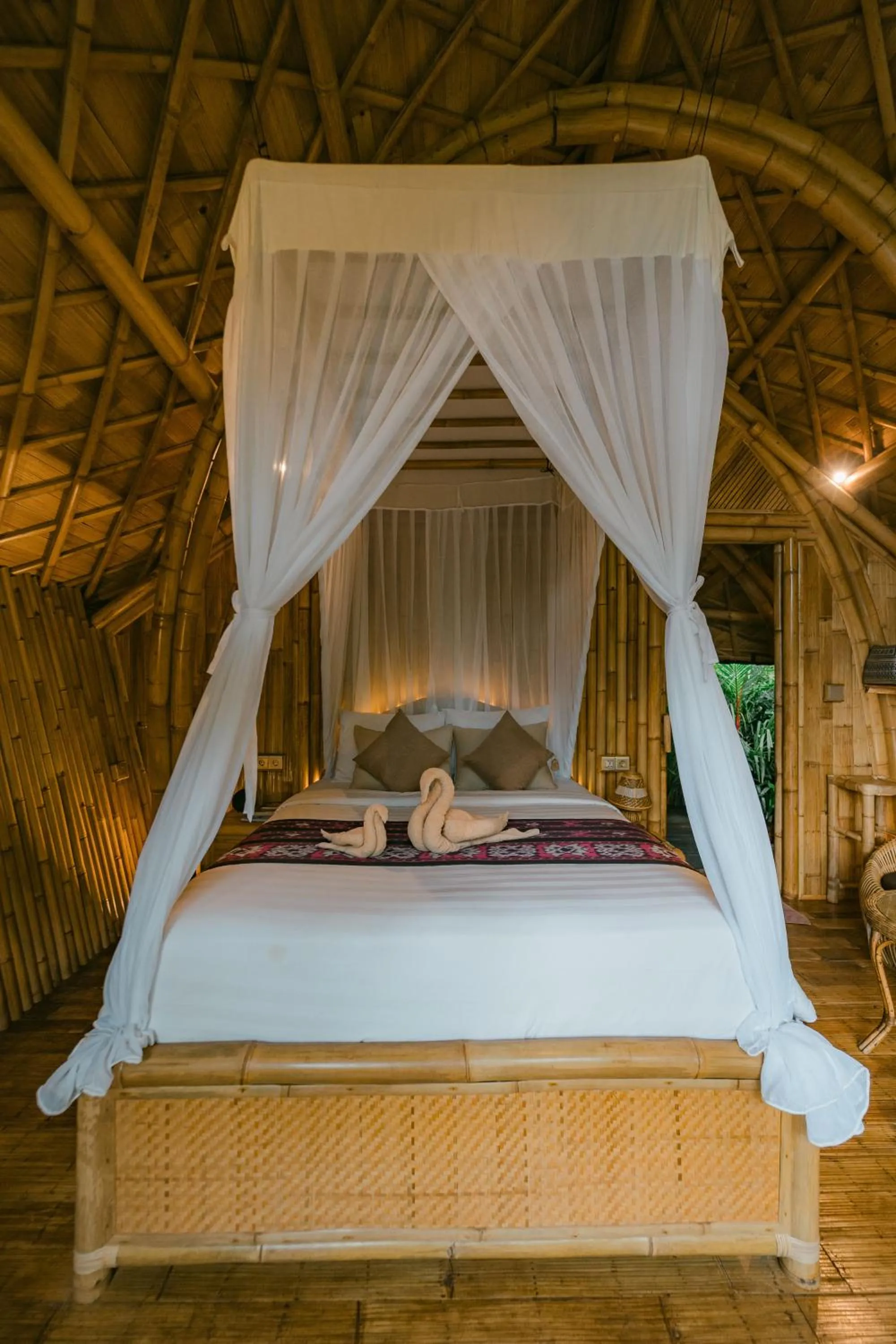 Bed in Arcada Bali Bamboo House