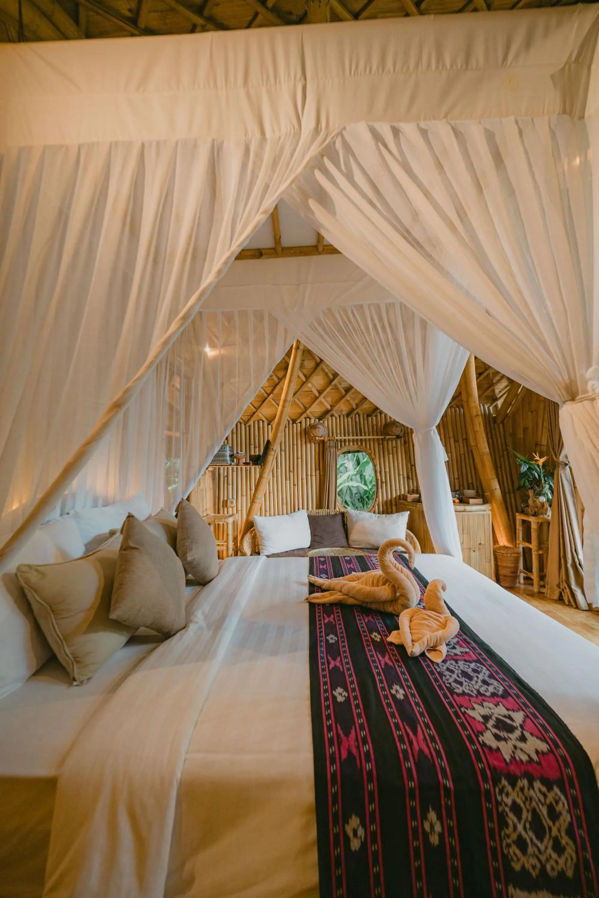 Bed in Arcada Bali Bamboo House