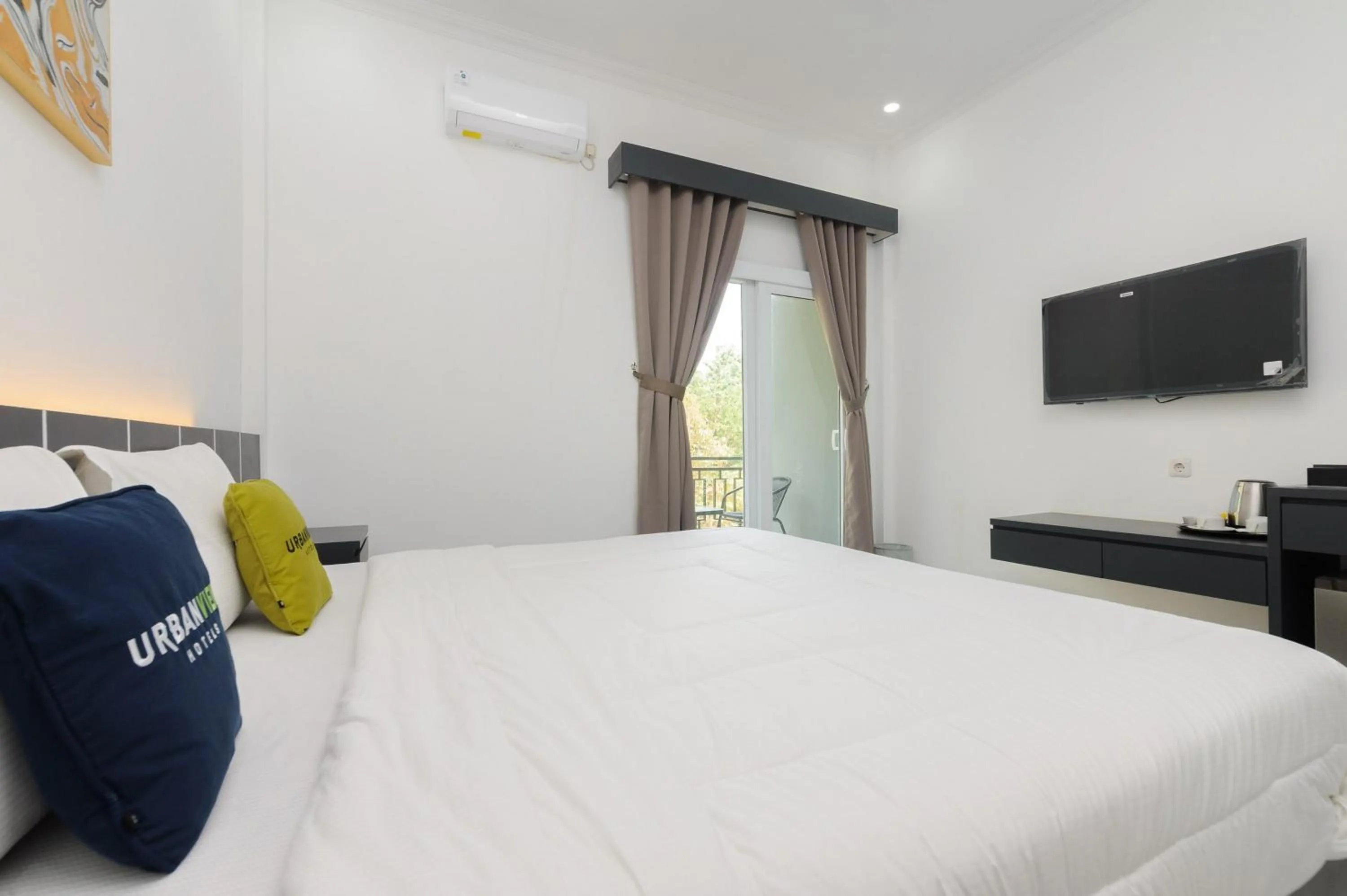 Bedroom, Bed in Urbanview Hotel AnD Lampung by RedDoorz