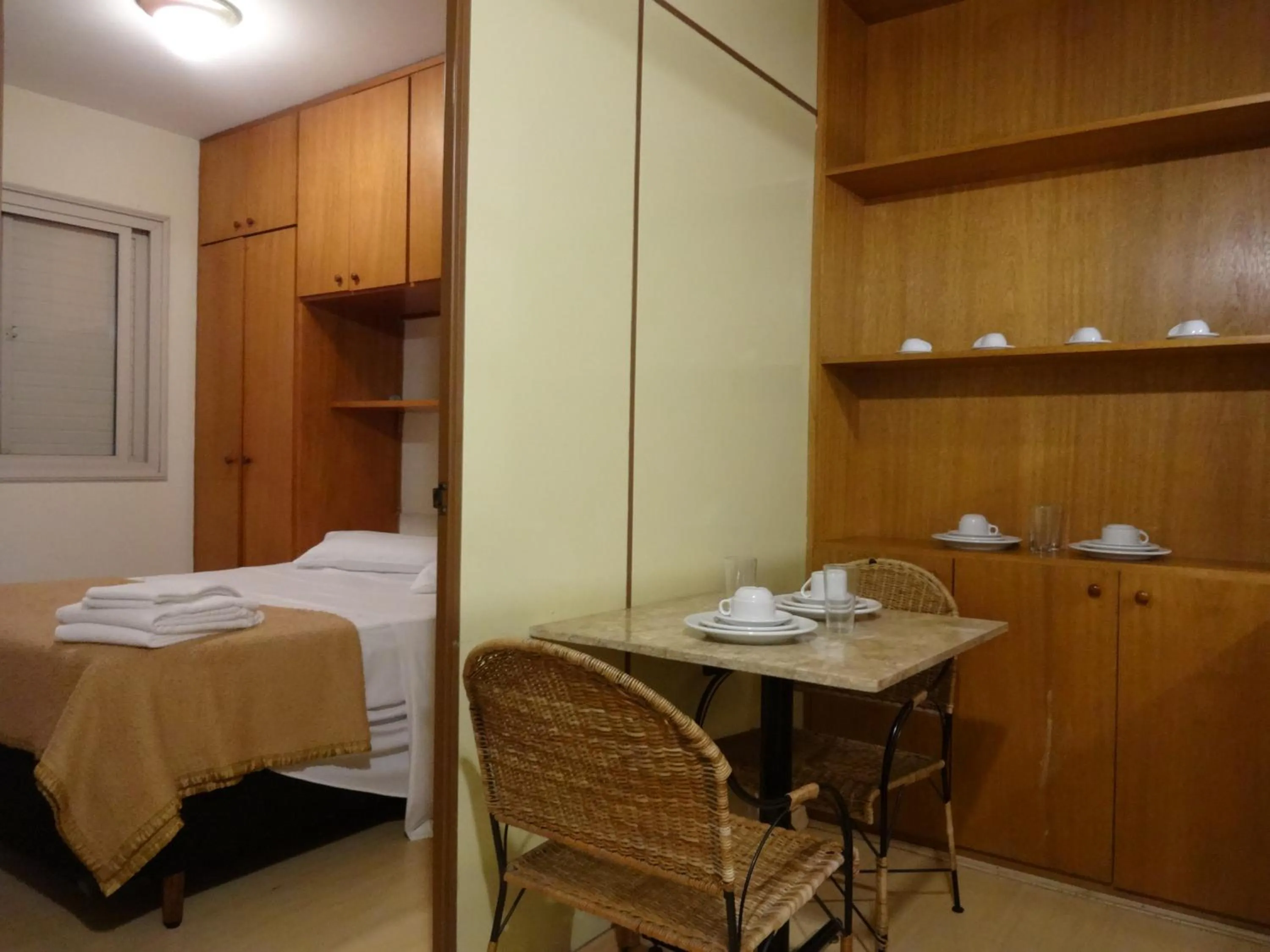 Kitchen or kitchenette, Bed in Residencial Genéve