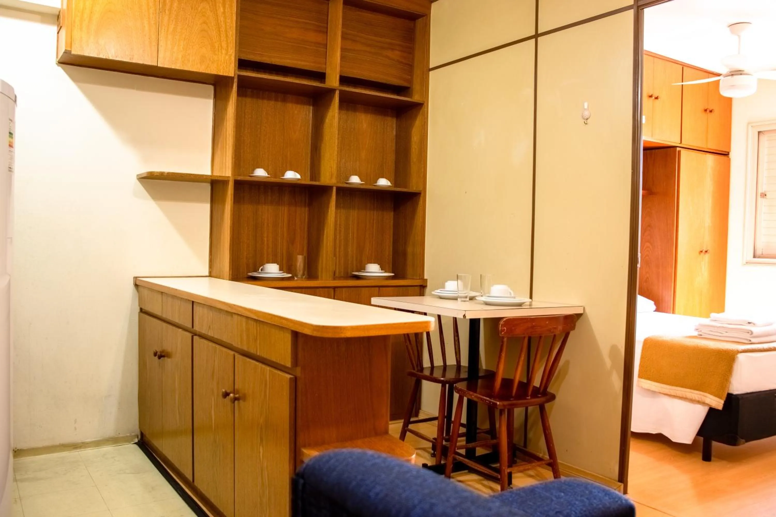 Kitchen or kitchenette, Bed in Residencial Genéve