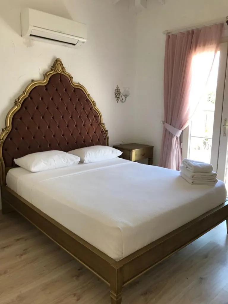Bed in Alacati Alaris Hotel