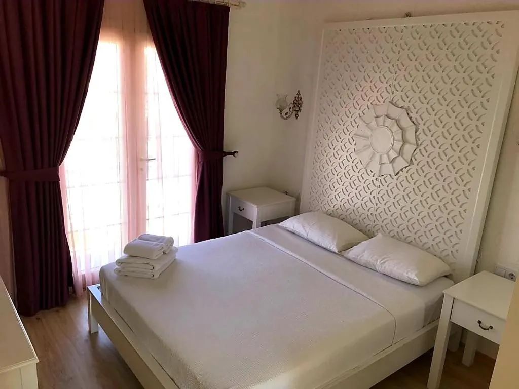 Bed in Alacati Alaris Hotel