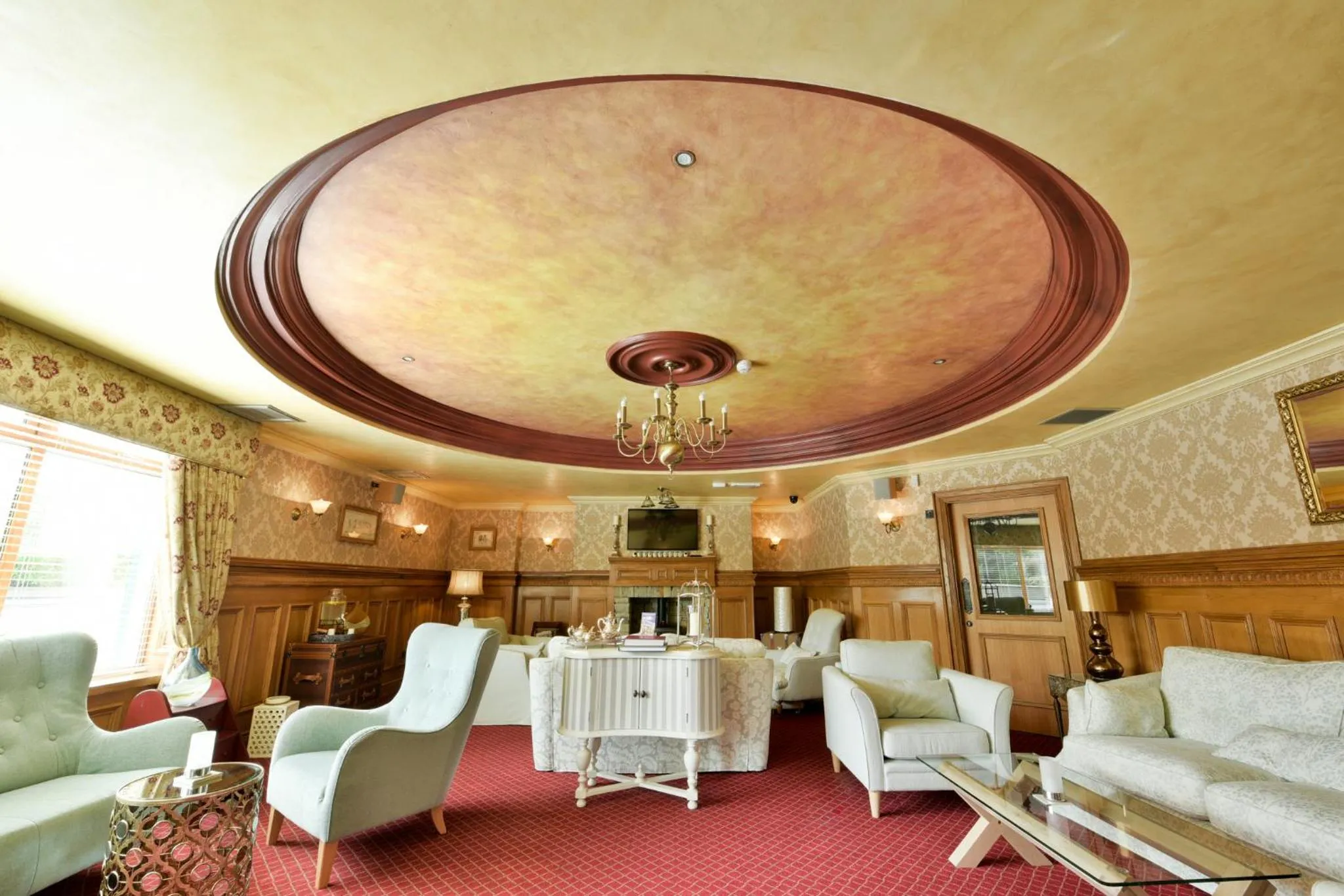 Communal lounge/ TV room in Ballyliffin TownHouse Boutique Hotel