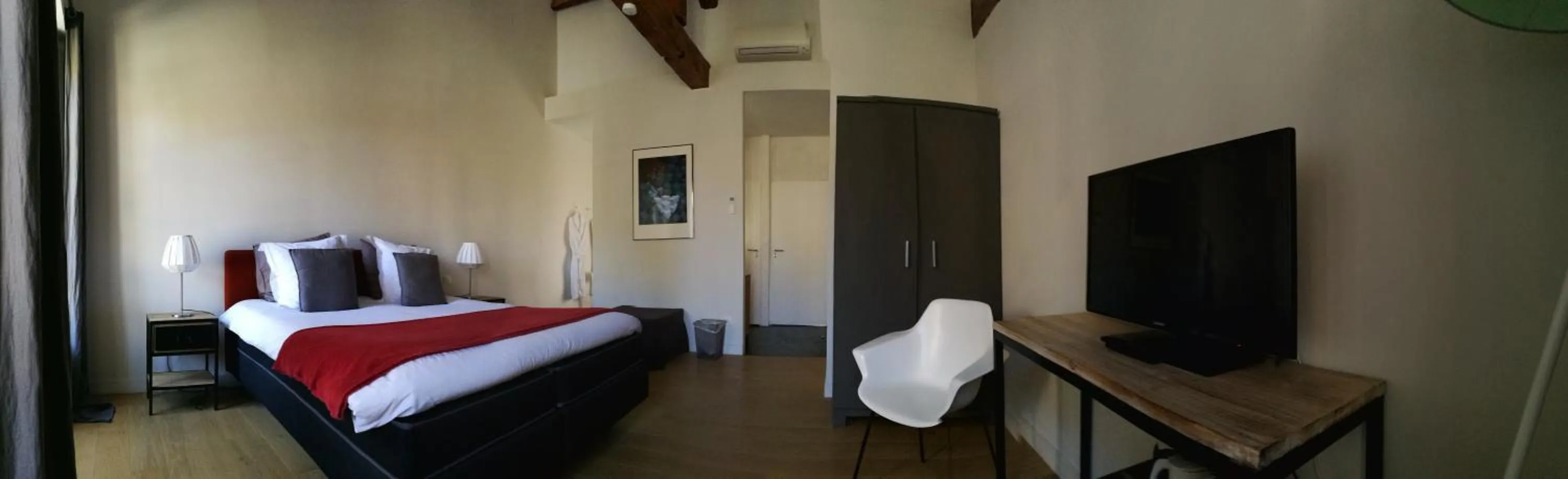 Bed in L'Observance Bed & Breakfast